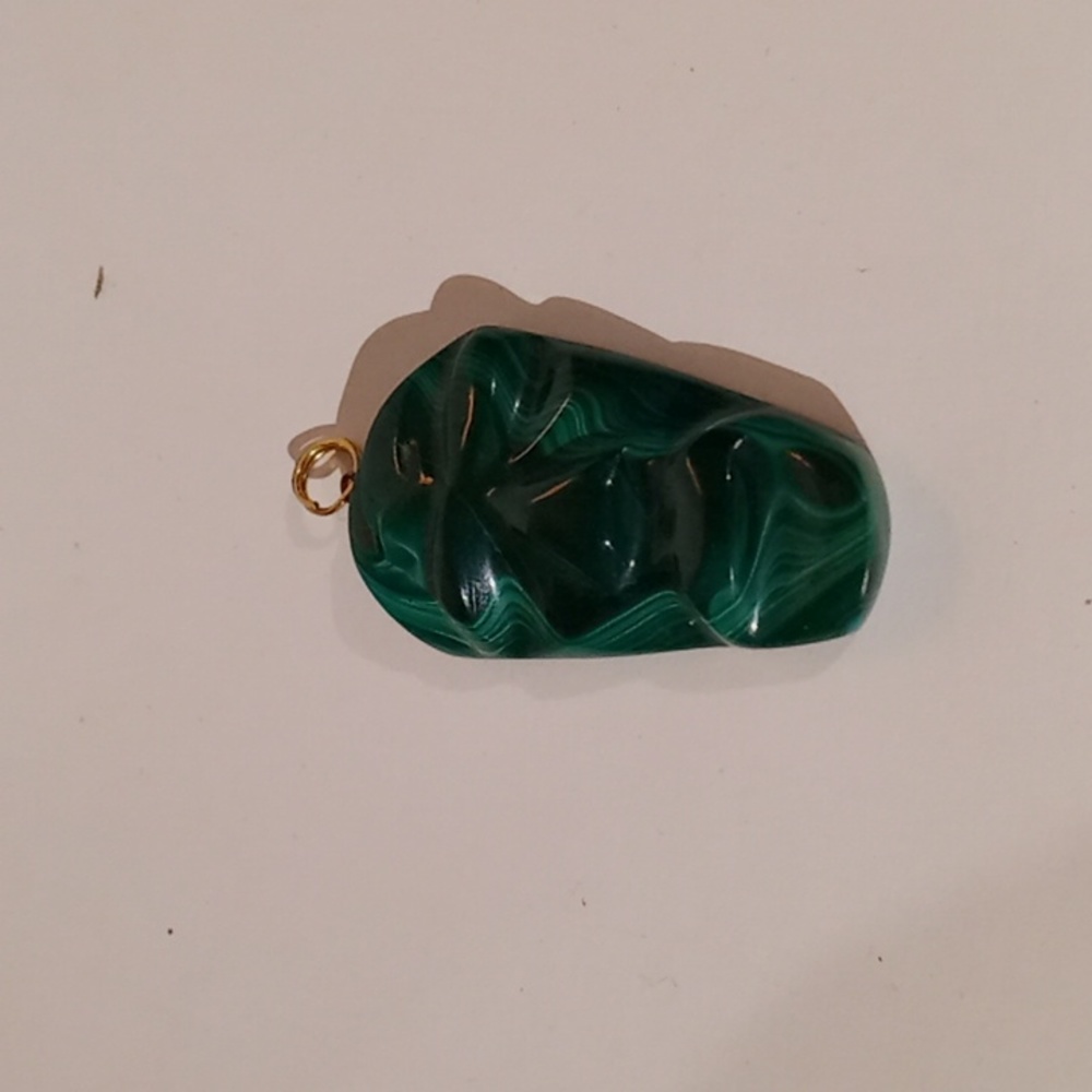 Malachite carved tribal pendant